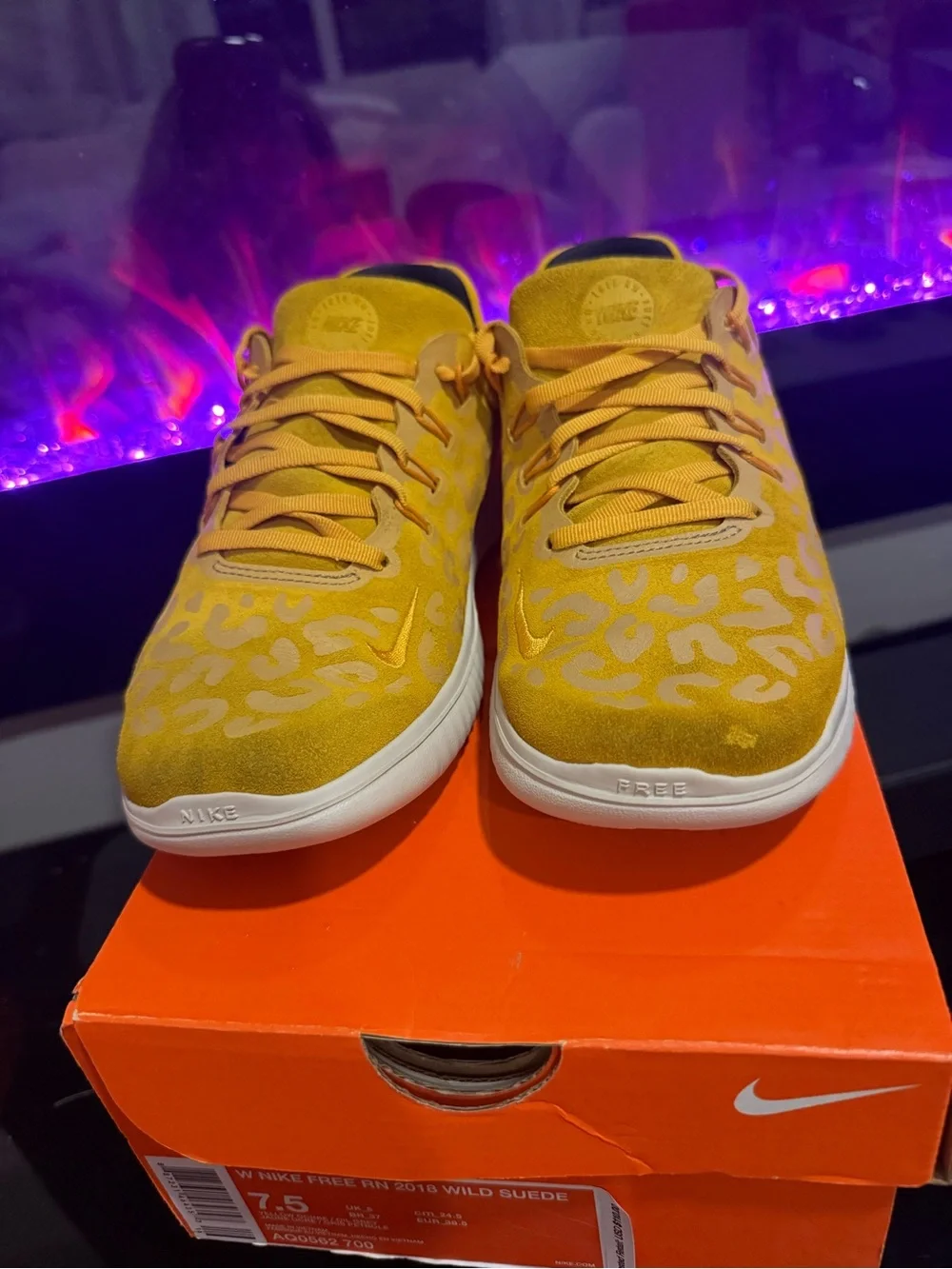 Nike Women’s Yellow Leopard-Print Free RN Sneakers